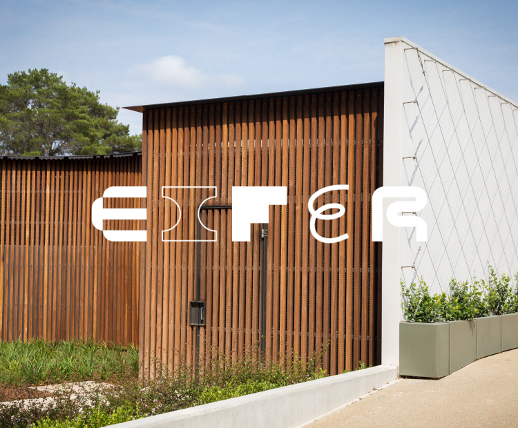 White Eifer logo on image of building with timber cladding and greenery