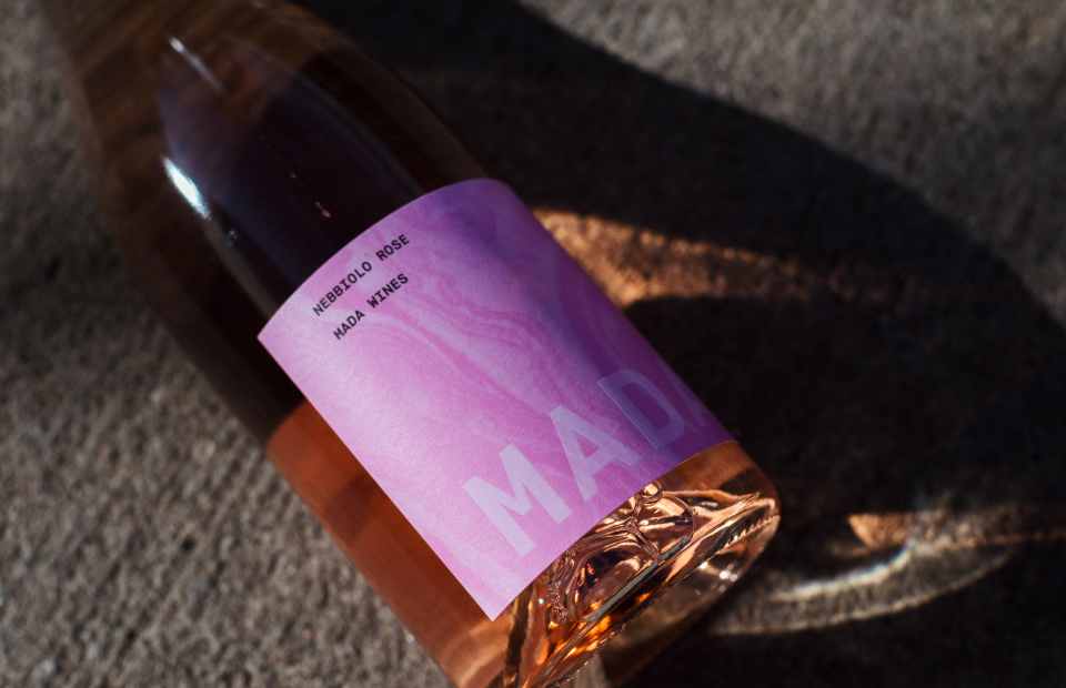 Close up of Rose wine bottle with pink label.
