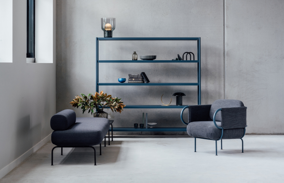 Photograph of Nave collection including shelves, armchair and modular lounge.