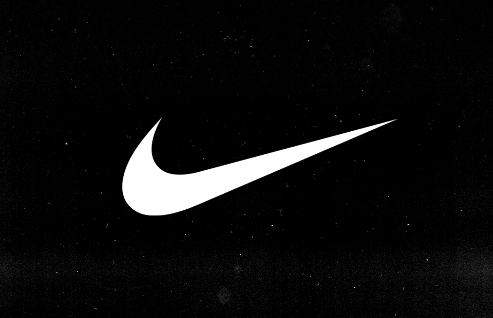 White Nike logo on black background