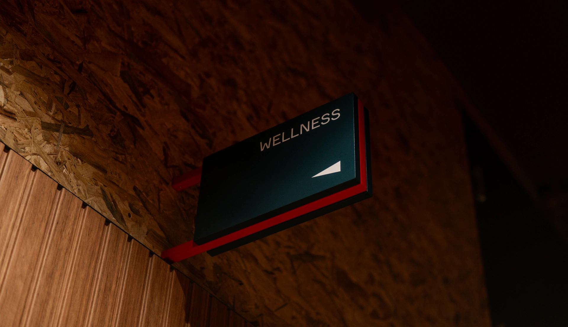 Wellness sign showing brand application to wayfinding