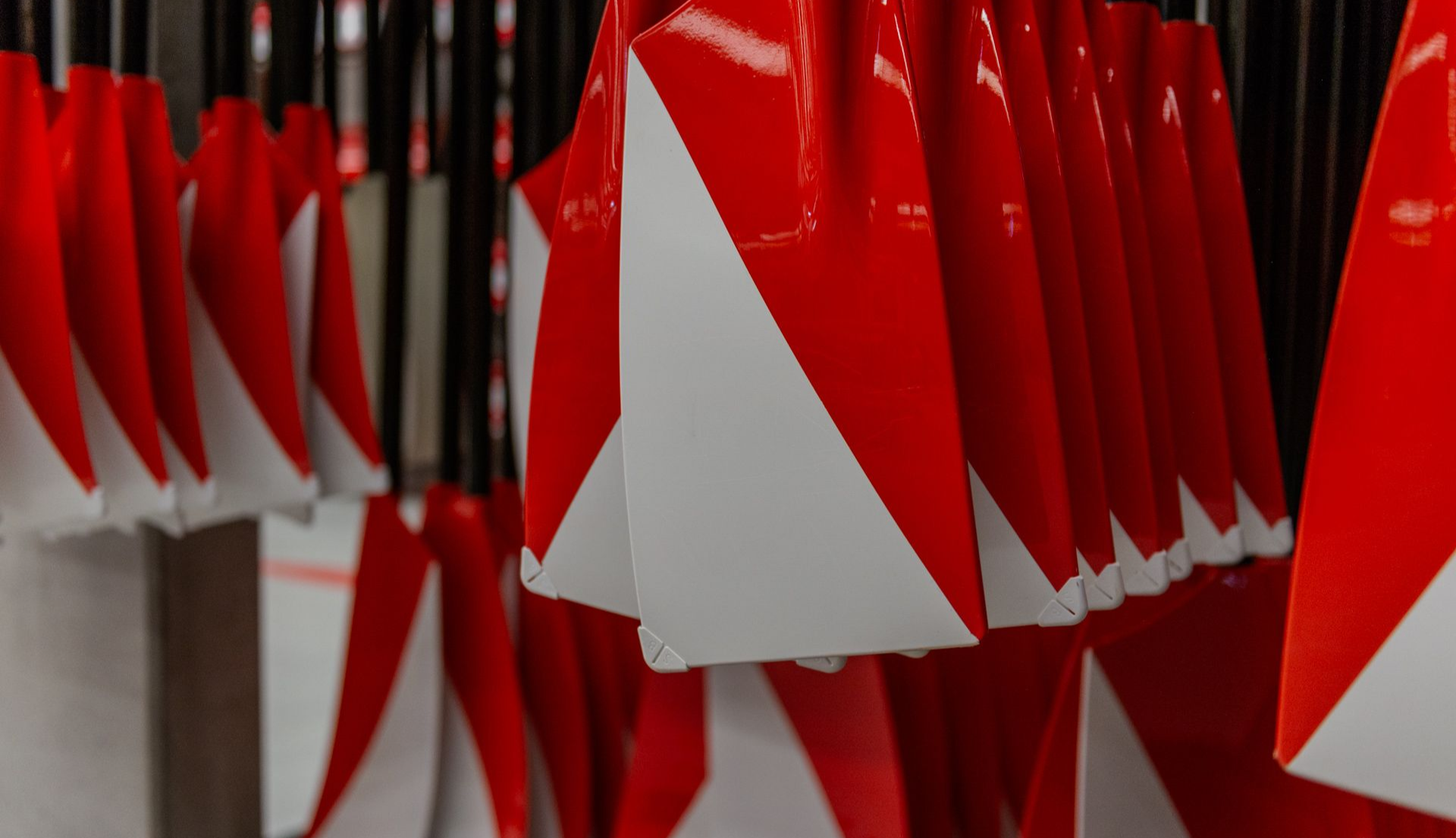 Red Shed oars handing in rows