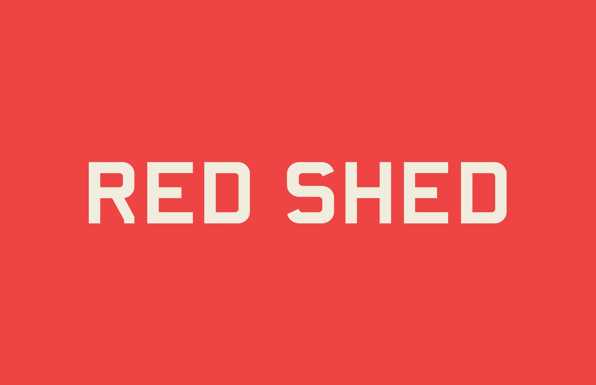 Beige Red Shed logo on red background